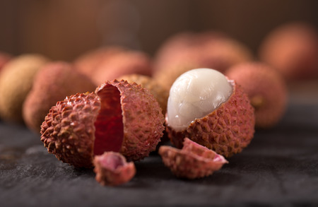 Fresh lychee on a wooden backgroundの写真素材