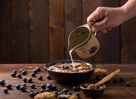 Muesli with blueberry and honey - healthy breakfast の写真素材