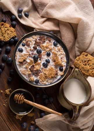 Muesli with blueberry and honey - healthy breakfast の写真素材
