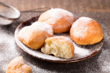 homemade  traditional donuts with powdered sugarの写真素材