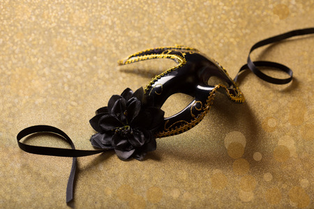 Image of black elegant venetian mask on glitter backgroundの写真素材