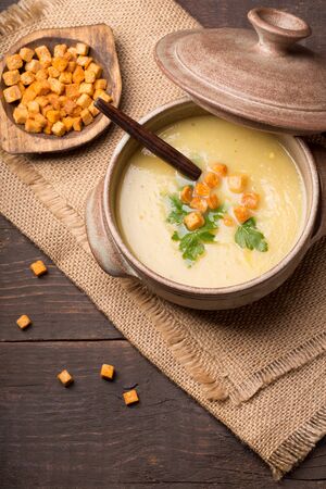 celery cream soup on wooden tableの写真素材