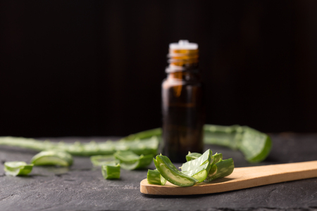 Close up of Aloe Vera plant  and essential oil bottleの写真素材