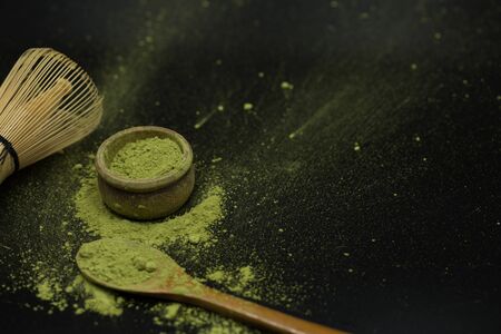 green matcha tea over black background の写真素材