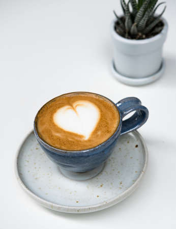 Hot Cappuccino isolated on white backgroundの写真素材