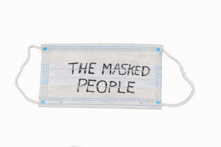 the masked people drawn on a face mask on a white backgroundの写真素材