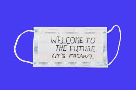 welcome to the freaky future face mask with blue background.の写真素材