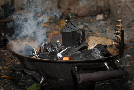 Barbecue grill with fire on nature, outdoor, close upの写真素材