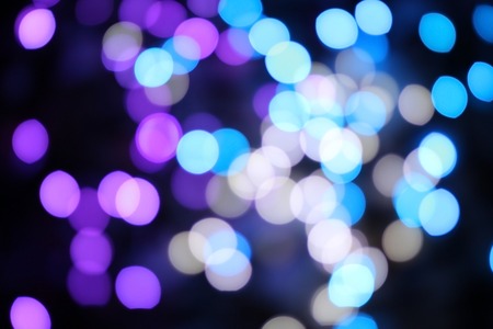 color defocused glitter background with abstract bokehの写真素材