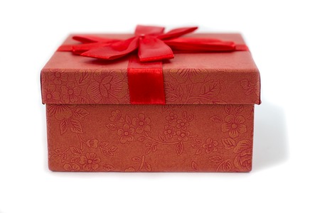 Red gift box isolated on white background.の写真素材