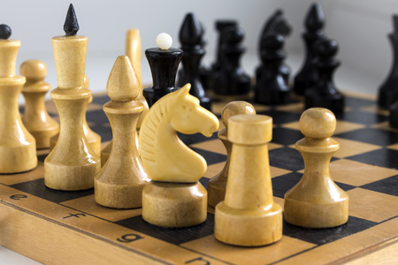 chess pieces are lined up in a rowの写真素材