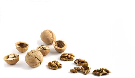 nuts with walnut shell and kernel with copy space on white background.