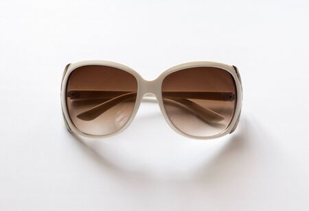Stylish Women's sunglasses in white rim for UV protection.の写真素材