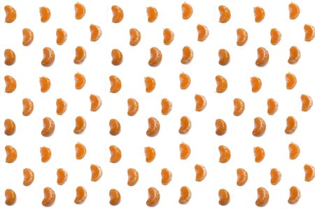 the pattern of the Mandarin slices on a white background.の写真素材