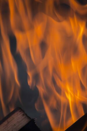 fire background, from a bright fire on wooden logsの写真素材