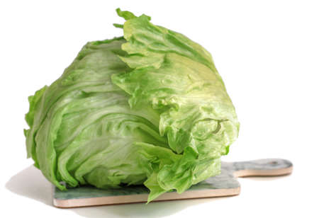 green iceberg lettuce isolated on white backgroundの写真素材