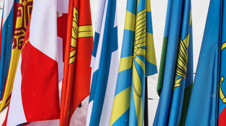 Russia, Novocheboksarsk, February 2021: the flags of the Russian troops and the national flag are...