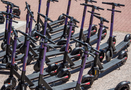 Russia, Rosa Khutor, July 16, 2021, scooter parking for tourists, eco-transport for moving around the resort.のeditorial素材