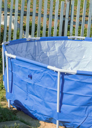 The frame pool is open without water, a newly assembled summer concept