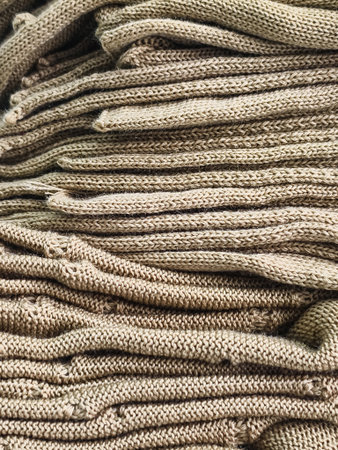 textured background of knitted details knitted in production for design purposes
