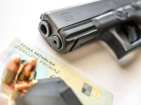 Czech firearms license with pistol and ammunition.のeditorial素材