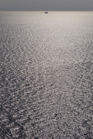 Journey on a yacht to tropical islandの写真素材