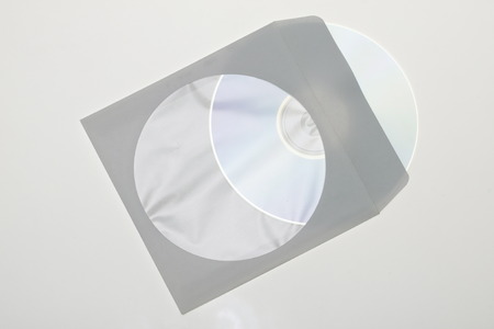 CD dvd blue ray with paper case isolated on a white backgroundの写真素材