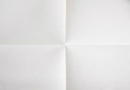 white sheet of paper folded in fourの写真素材