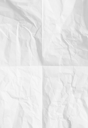 white sheet of paper folded and battered With texture.の写真素材
