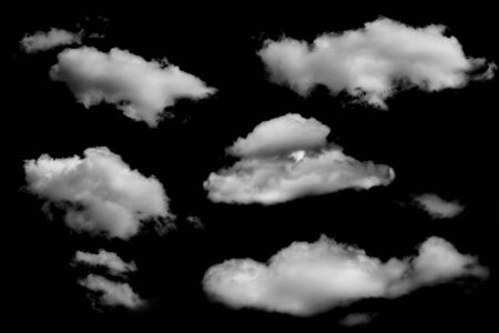 Set of white clouds over black sky. Design elementsの写真素材