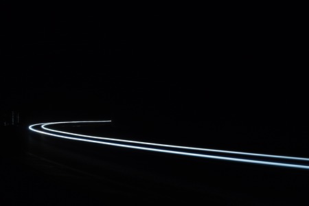Light tralight trails in tunnel. Art image. Long exposure photo taken in a tunnel.の写真素材