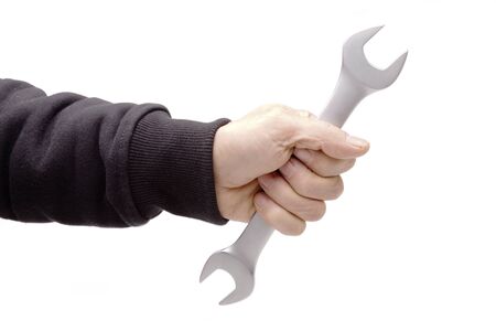Wrench in hand. Isolated on white background.の写真素材