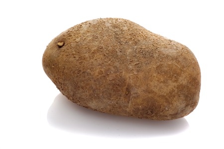 old potato isolated on white backgroundの写真素材