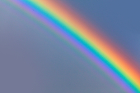 beautiful rainbow in blue sky after the rain