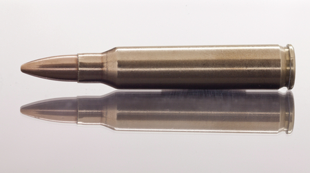 single bullet over mirror, full focus, for crime, military or terrorism themes