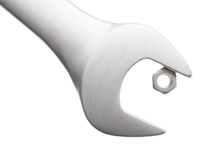 Hand wrench and small metal nutの写真素材
