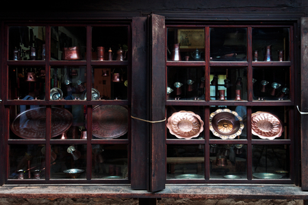 old copper plate on windowの写真素材