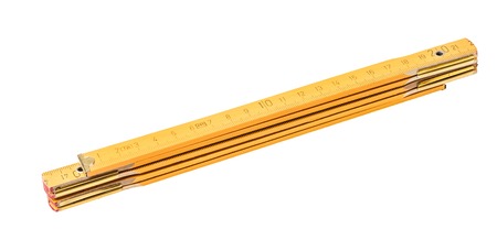Folding ruler isolated on white