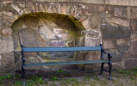 Bench in the ruin of an old castleの写真素材