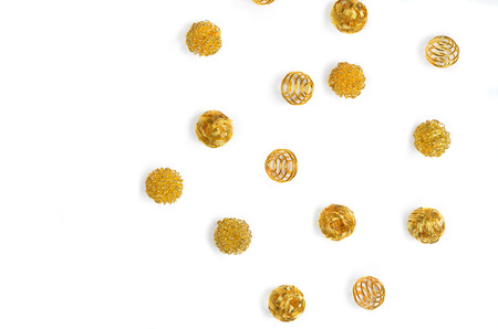 golden balls isolated over a white backgroundの写真素材