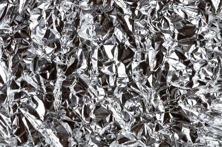 a thin sheet of crumpled silver foil