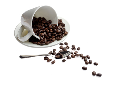 White coffee cup with scattered coffeeの写真素材