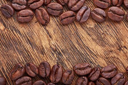 Frame of coffee on a wooden backgroundの写真素材