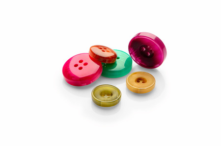 colored buttons on the isolateの写真素材