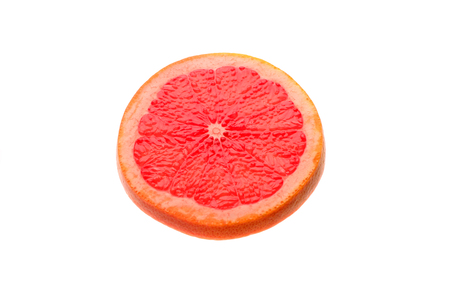 slice of grapefruit on the whiteの写真素材