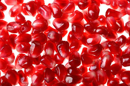 ripe pomegranate grains backgroundの写真素材