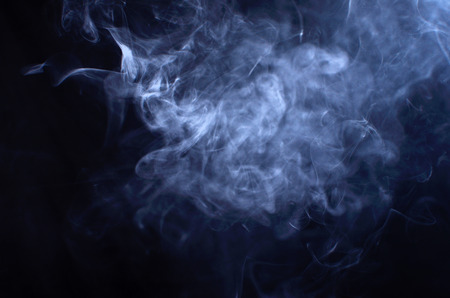 Smoke isolated on black backgroundの写真素材