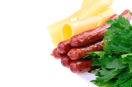 sausages with cheese and parsley on a plateの写真素材