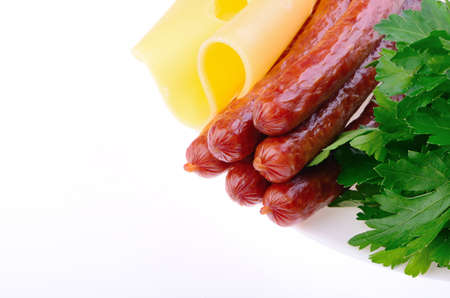 sausages with cheese and parsley on a plateの写真素材