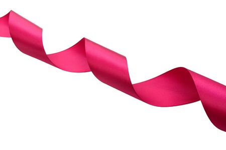 red ribbon wound in a spiral on the diagonal. Celebration. Valentine's Day. New Year. Mothers Day. Celebration concept. Gift.の写真素材